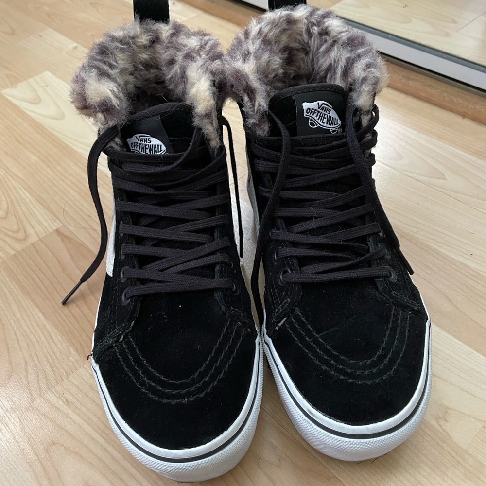 Black suede and leopard print fur lined vans.
